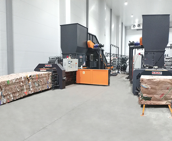 Soluție automată de eliminare a deșeurilor de ambalare la Centrul de Logistică de Supermarket de top din Rusia